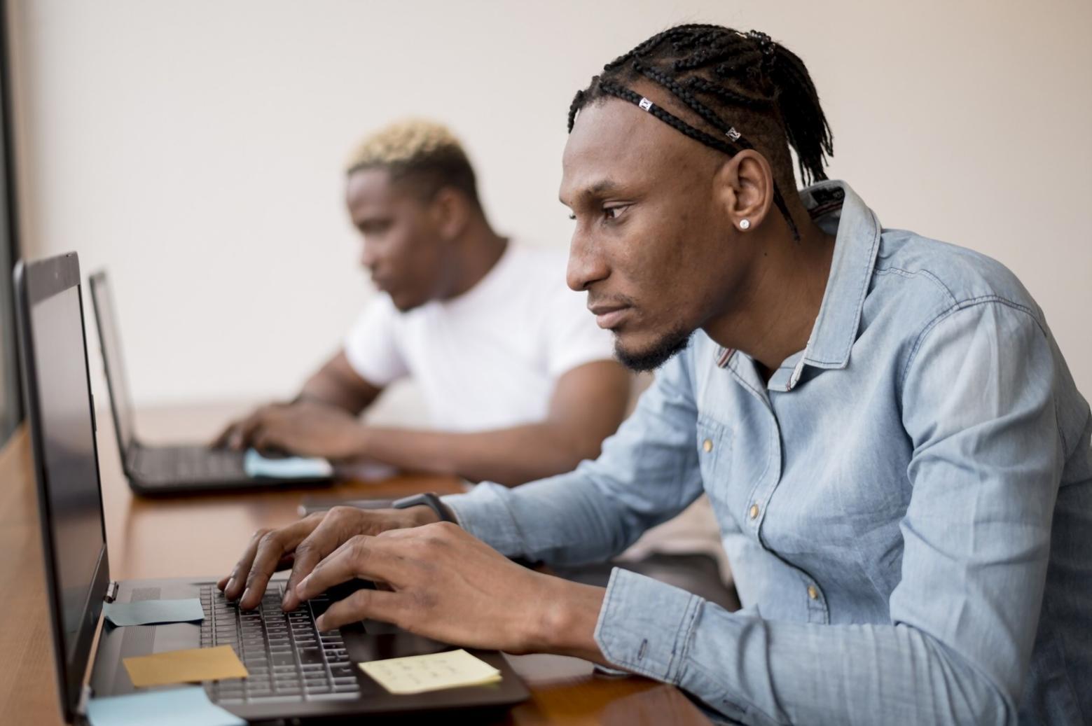 One-on-one financial coaching session with charts and planning materials